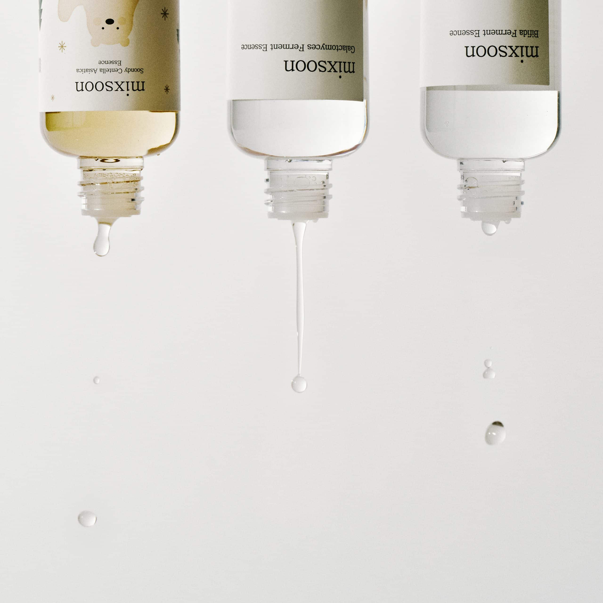 Mixsoon skincare serums dripping out of containers