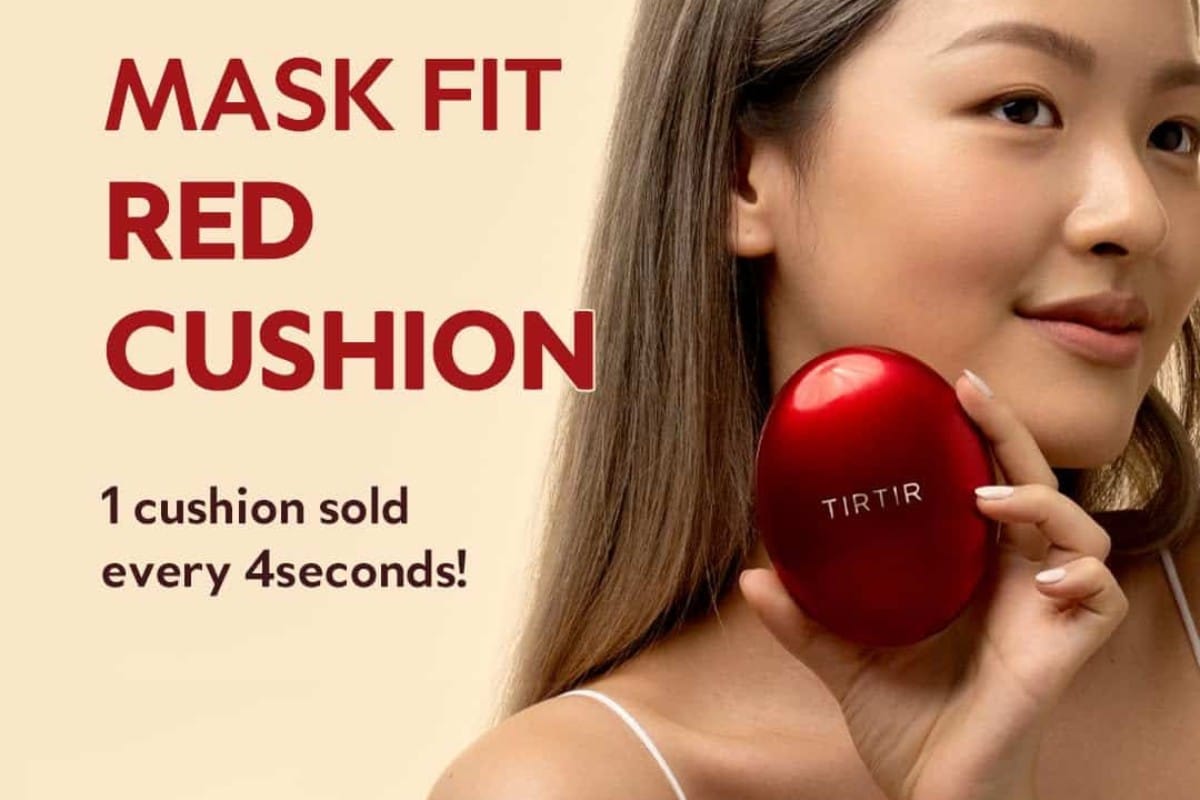 Woman holding tirtir cushion foundation makeup